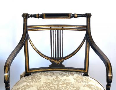 Pair English Regency Ebonized and Parcel gilt Armchairs with Caned Seat