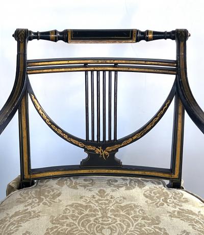 Pair English Regency Ebonized and Parcel gilt Armchairs with Caned Seat