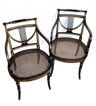 Pair English Regency Ebonized and Parcel gilt Armchairs with Caned Seat