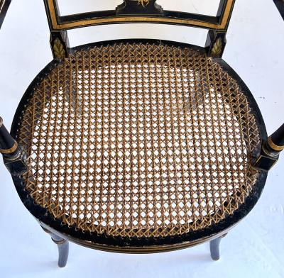 Pair English Regency Ebonized and Parcel gilt Armchairs with Caned Seat
