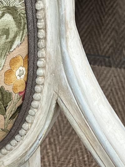 Pair French Louis XVI Ivory Painted Oval Back Arm Chairs with Celadon Highlights