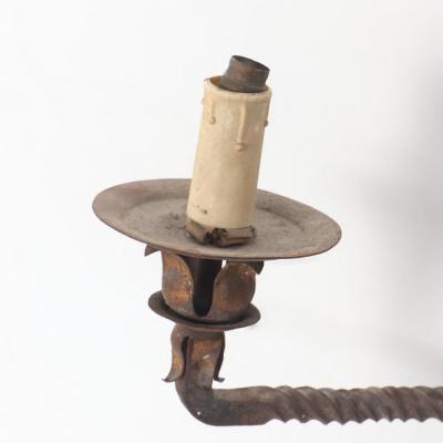 Pair French iron two arm wall sconces with old traces of gold circa 1910 