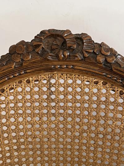 Pair Louis XVI Style Carved Walnut Arm Chairs with Caned Back Seat