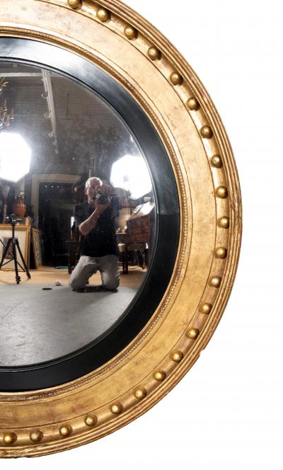 Pair Of Large Regency Giltwood Convex Mirrors