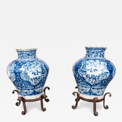 Pair Of Mexican Talavera Poblana Pottery Blue And White Vases With Iron Stands