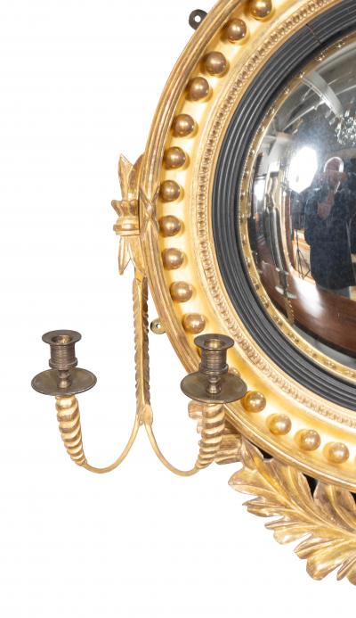 Pair Of Regency Giltwood And Ebonized Convex Girandole Mirrors