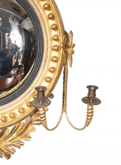 Pair Of Regency Giltwood And Ebonized Convex Girandole Mirrors