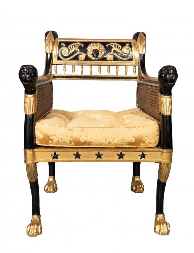 Pair Of Regency Style Ebonized And Parcel Gilt Armchairs