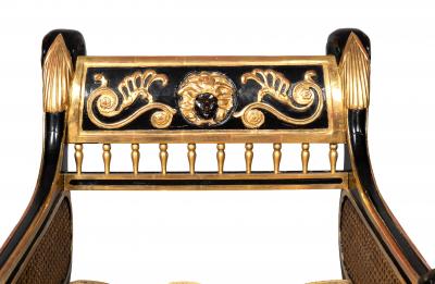 Pair Of Regency Style Ebonized And Parcel Gilt Armchairs