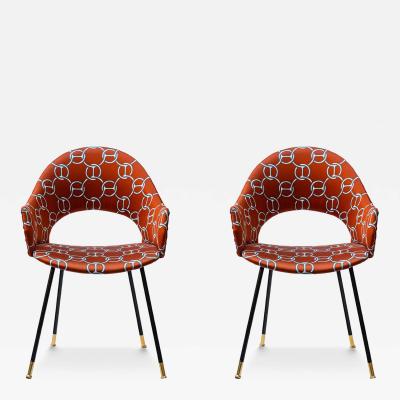 Pair iconic round back chairs upholstered in Hermes fabric