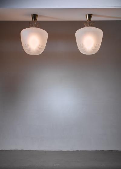 Pair large Art Deco frosted glass and brass pendants