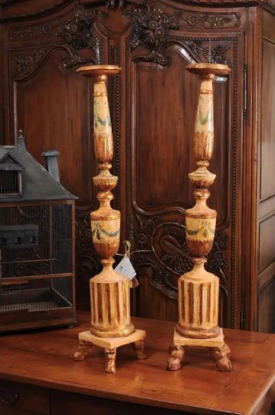Pair of 18th Century Neoclassical Painted and Gilded Candlesticks with Hoof Feet