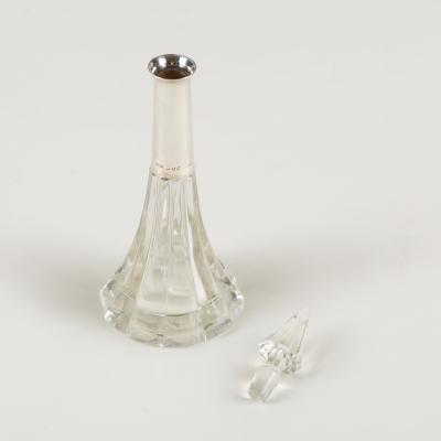 Pair of 1920s English Art Deco cut glass and silver collar bottles