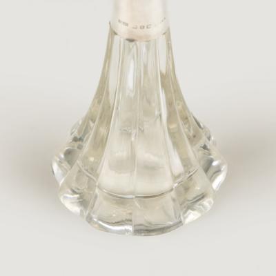 Pair of 1920s English Art Deco cut glass and silver collar bottles