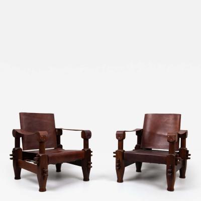 Pair of 1960s hardwood and leather armchairs