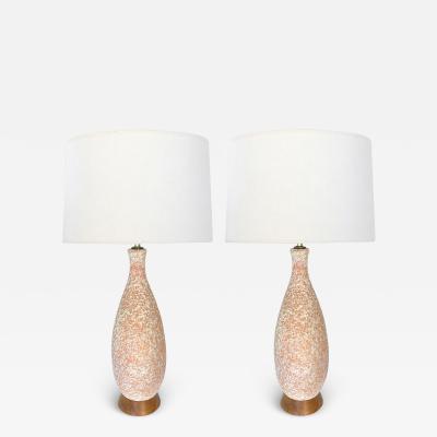 Pair of 1960s peach and white lava glaze bottle form lamps