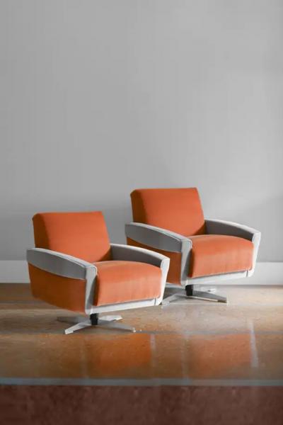 Pair of 1960s swivel armchairs covered in Dedar fabric
