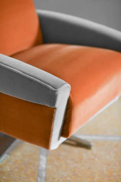 Pair of 1960s swivel armchairs covered in Dedar fabric
