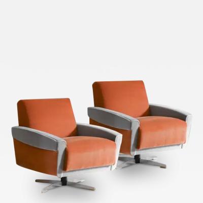 Pair of 1960s swivel armchairs covered in Dedar fabric