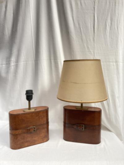 Pair of 1970s leather lamps in the style of Jacques Adnet