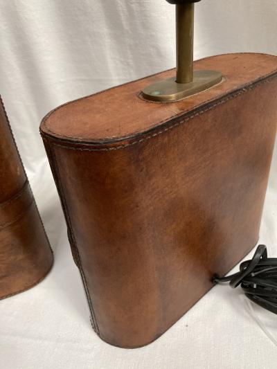 Pair of 1970s leather lamps in the style of Jacques Adnet