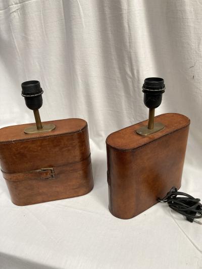 Pair of 1970s leather lamps in the style of Jacques Adnet