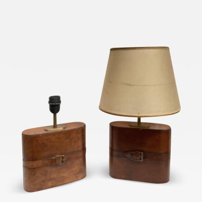 Pair of 1970s leather lamps in the style of Jacques Adnet