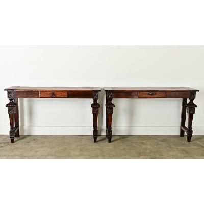 Pair of 19th Century Louis XVI Walnut Consoles