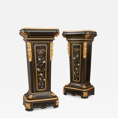 Pair of 19th century hardstone ormolu and ebonised wood pedestal cabinets