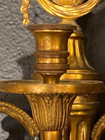 Pair of Adams Style Five Arm Tassel Decorated Dore Bronze Wall Candelabras