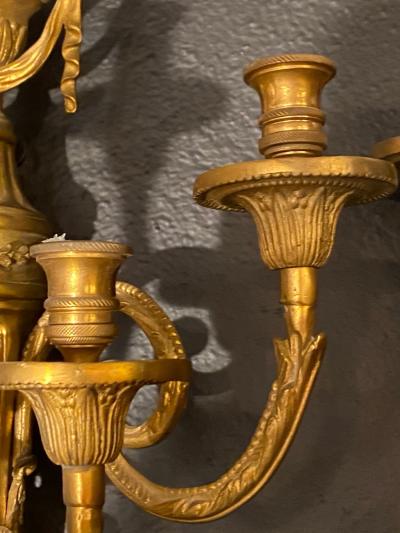 Pair of Adams Style Five Arm Tassel Decorated Dore Bronze Wall Candelabras