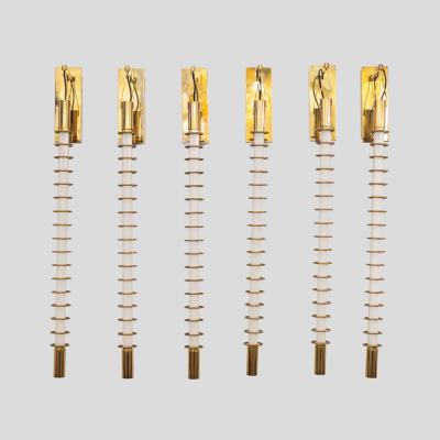 Pair of Albini 17 wall lights brass rings and tube light