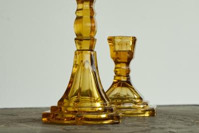 Pair of Amber Colored Art Deco Candle Holders in Pressed Glass 1930s