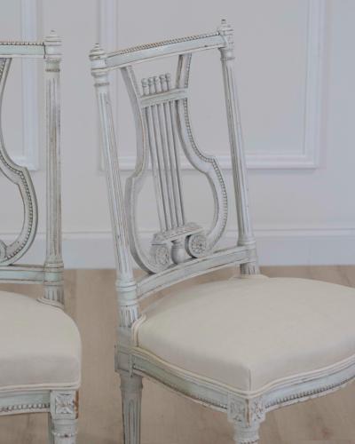 Pair of Antique French Neoclassical Painted Chairs in Antique Linen