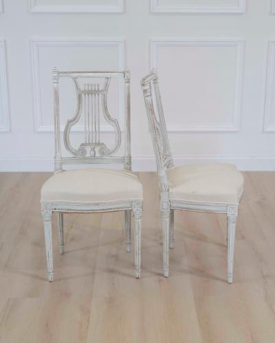 Pair of Antique French Neoclassical Painted Chairs in Antique Linen