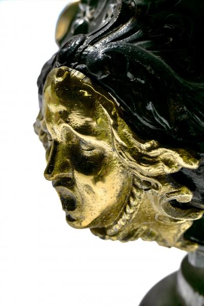 Pair of Antique French Rococo Style Black Iron Urns Adorned with Brass Figures