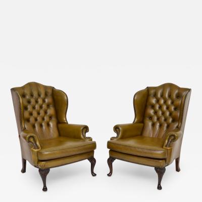 Pair of Antique Leather Wing Back Armchairs