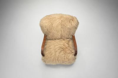 Pair of Art Deco Armchairs in Mongolian Longhair Sheepskin Europe ca 1930s