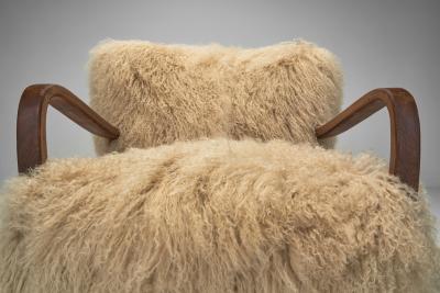 Pair of Art Deco Armchairs in Mongolian Longhair Sheepskin Europe ca 1930s