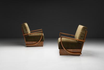 Pair of Art Deco Armchairs with Curved Arms Europe First half of the 20th C