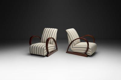 Pair of Art Deco Armchairs with Curved Arms and Striped Upholstery Europe 1930s