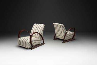 Pair of Art Deco Armchairs with Curved Arms and Striped Upholstery Europe 1930s