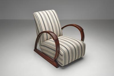Pair of Art Deco Armchairs with Curved Arms and Striped Upholstery Europe 1930s