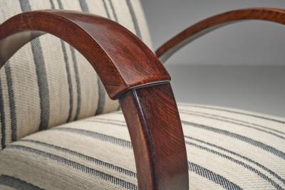 Pair of Art Deco Armchairs with Curved Arms and Striped Upholstery Europe 1930s