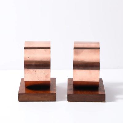 Pair of Art Deco Machine Age Loop Form Bookends in Copper Walnut
