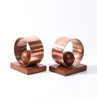 Pair of Art Deco Machine Age Loop Form Bookends in Copper Walnut