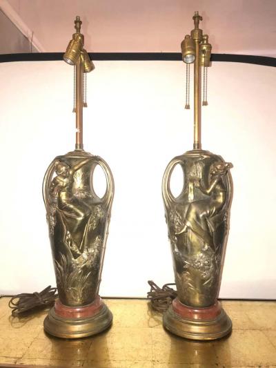 Pair of Art Nouveau Figural Urns Mounted as Lamps