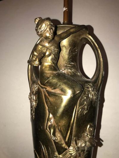 Pair of Art Nouveau Figural Urns Mounted as Lamps