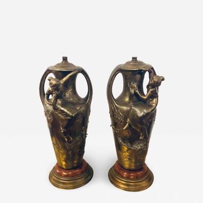 Pair of Art Nouveau Figural Urns Mounted as Lamps