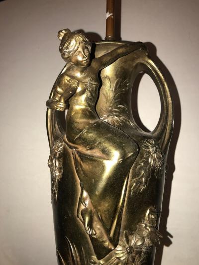 Pair of Art Nouveau Figural Urns Mounted as Lamps